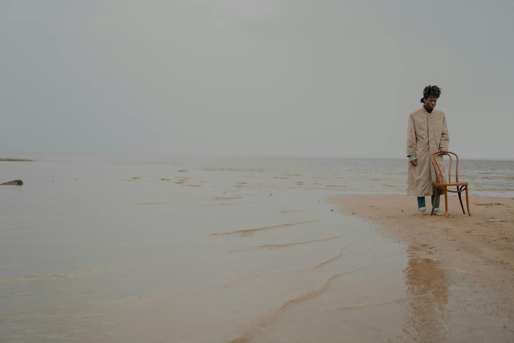 person standing ocean shore