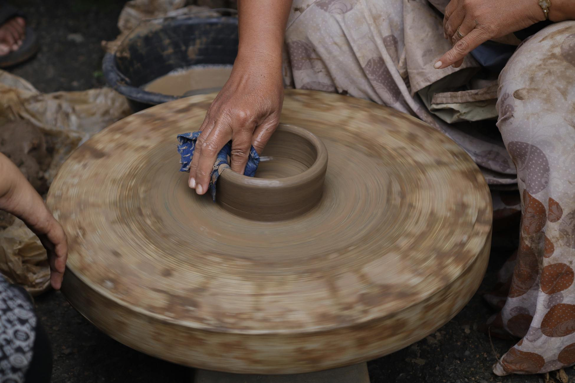 woman pottery studio garage